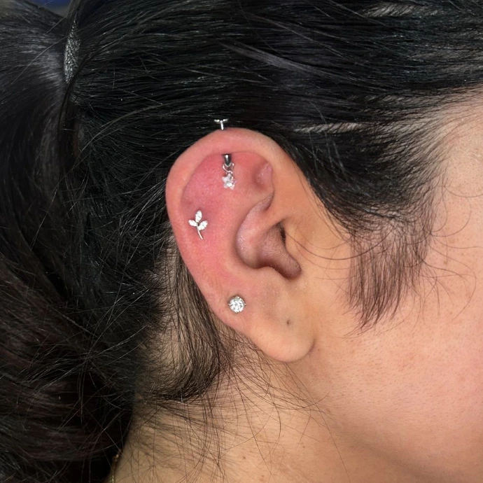 Helix ear piercing jewellery stud on upper cartilage